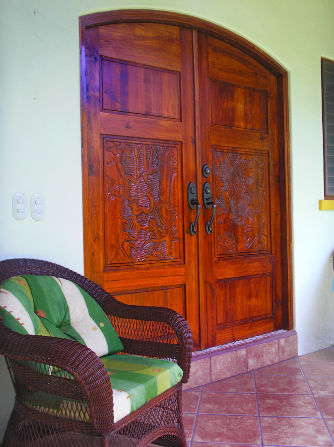 A Hard Wood Carved Door Built by Rarewood General Contractor in Puerto Jimenez Osa Peninsula