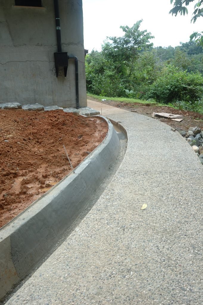 Garden Walkway of a Fine House/Lodge in the Hills of the Osa Peninsula, by Rarewood General Contractor in Puerto Jimenez